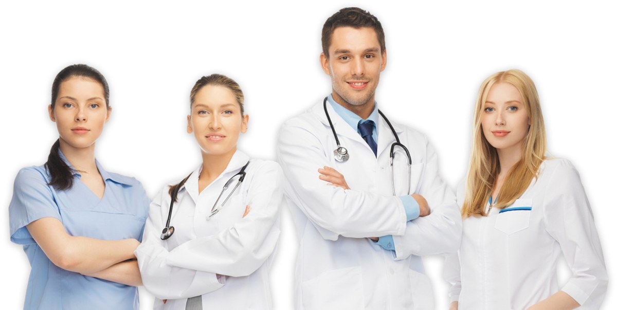 Clinician arranging healthcare icon blocks